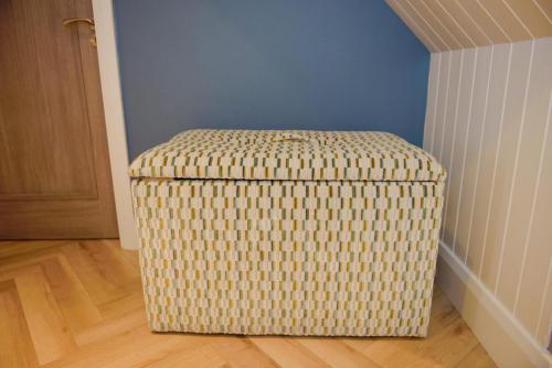 Bespoke storage box covered_geometric patterned fabric