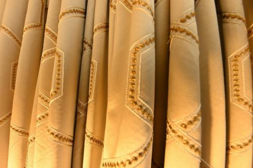 Champagne coloured curtains with gold embellishment - Sinead Cassidy Design