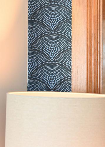 Close up of feature wallpaper in hallway design