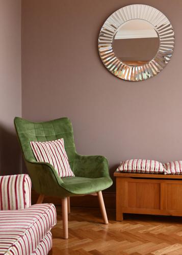 Colourtrend Chestnut Pink teamed with green velvet armchair