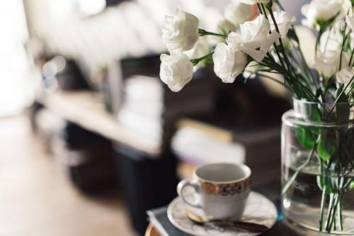 Flowers in vase and espresso cup