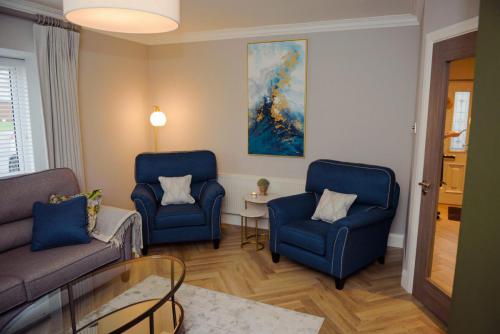 Finline armchair marble side tables