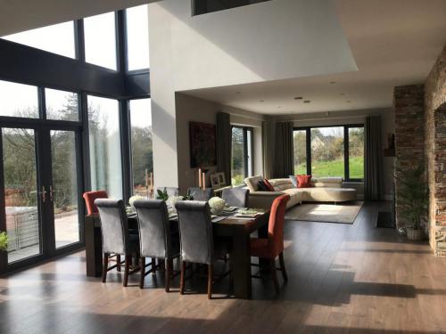 Living Dining area with grey and orange theme - Sinead Cassidy Design