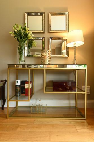 Living room console table with set of 4 rectangular mirrors glass lamp - Sinead Cassidy Design