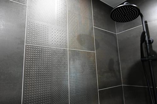 Metallic Tile Texture Black Showerhead