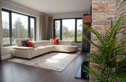 Sitting room orange and grey handmade rug - Sinead Cassidy Design