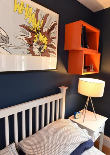 Vintage cartoon art and bedside lamp