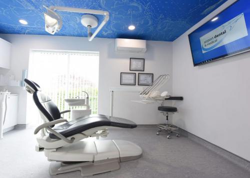 Cork dental surgery design with ceiling mural
