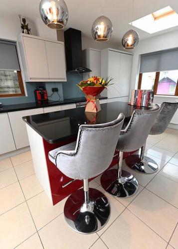 Kitchen design - with grey velvet stools