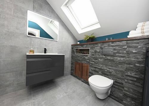Attic bathroom design with stone tile effect
