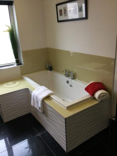 Bathroom design with laundry chute